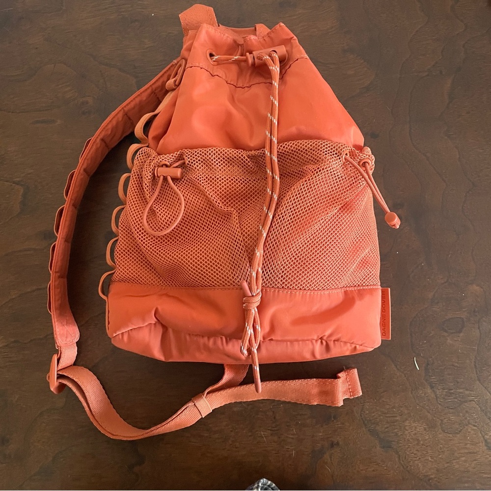 Orange Dagne Dover Nova Sling mini backpack